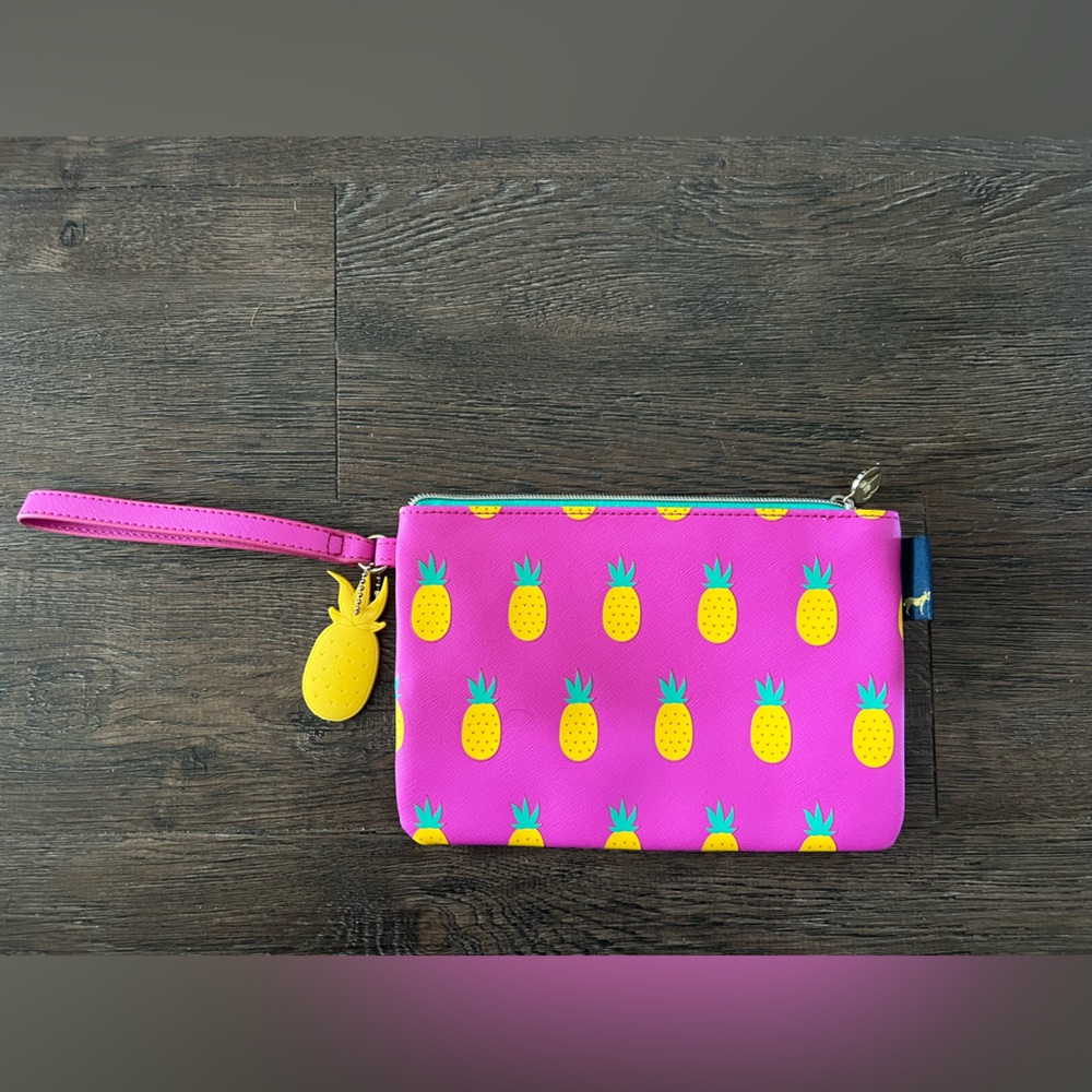 Brand new Dabney Lee New York pink clutch with pineapples and pineapple dangle.